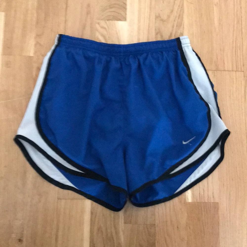 Blue, white, and black dry- fit Nike shorts